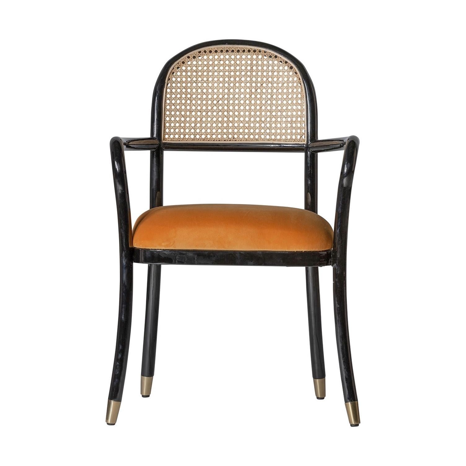 cane and velvet chair