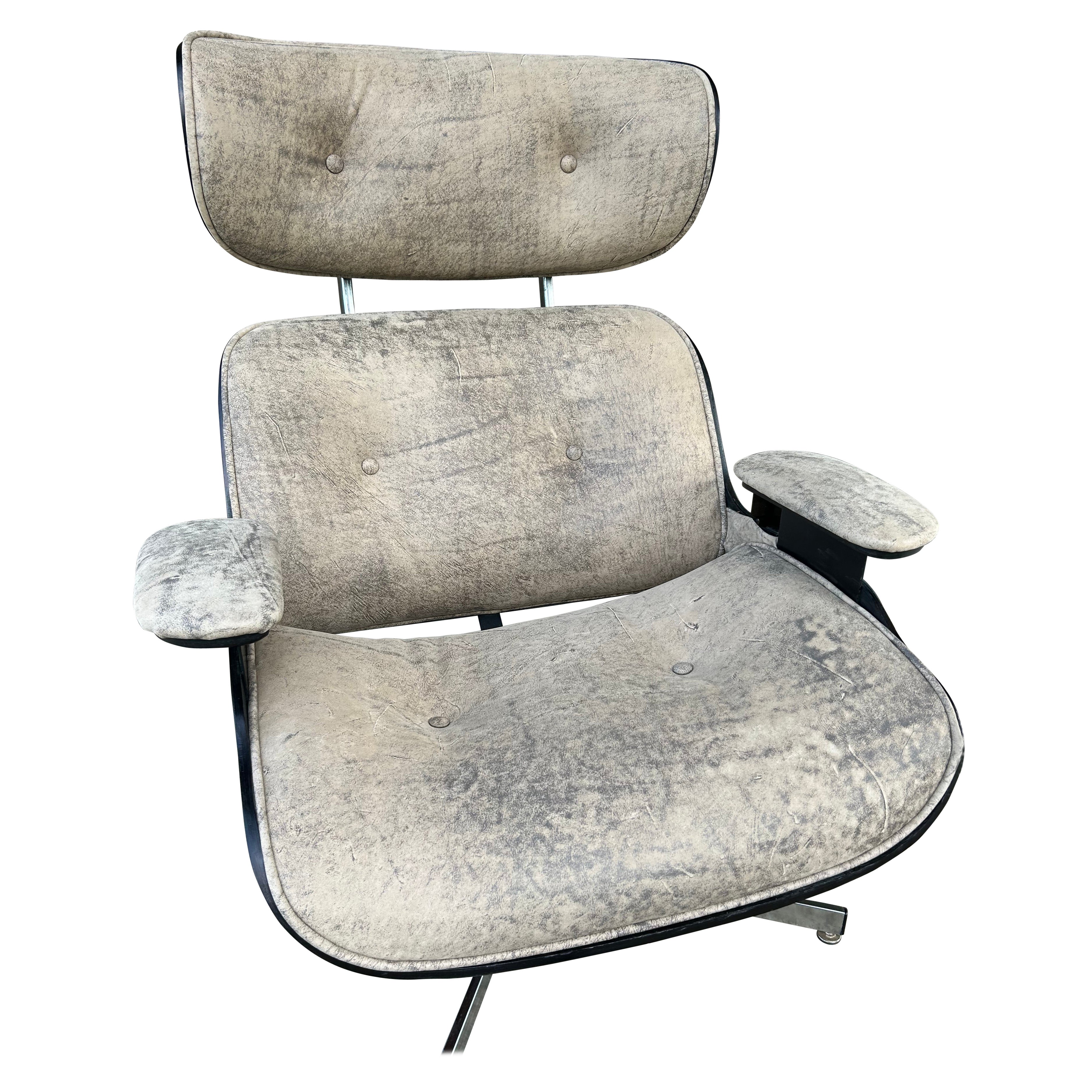 Silla giratoria y otomana MCM-Retapizada en venta