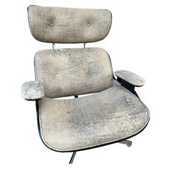 Silla giratoria y otomana MCM-Retapizada