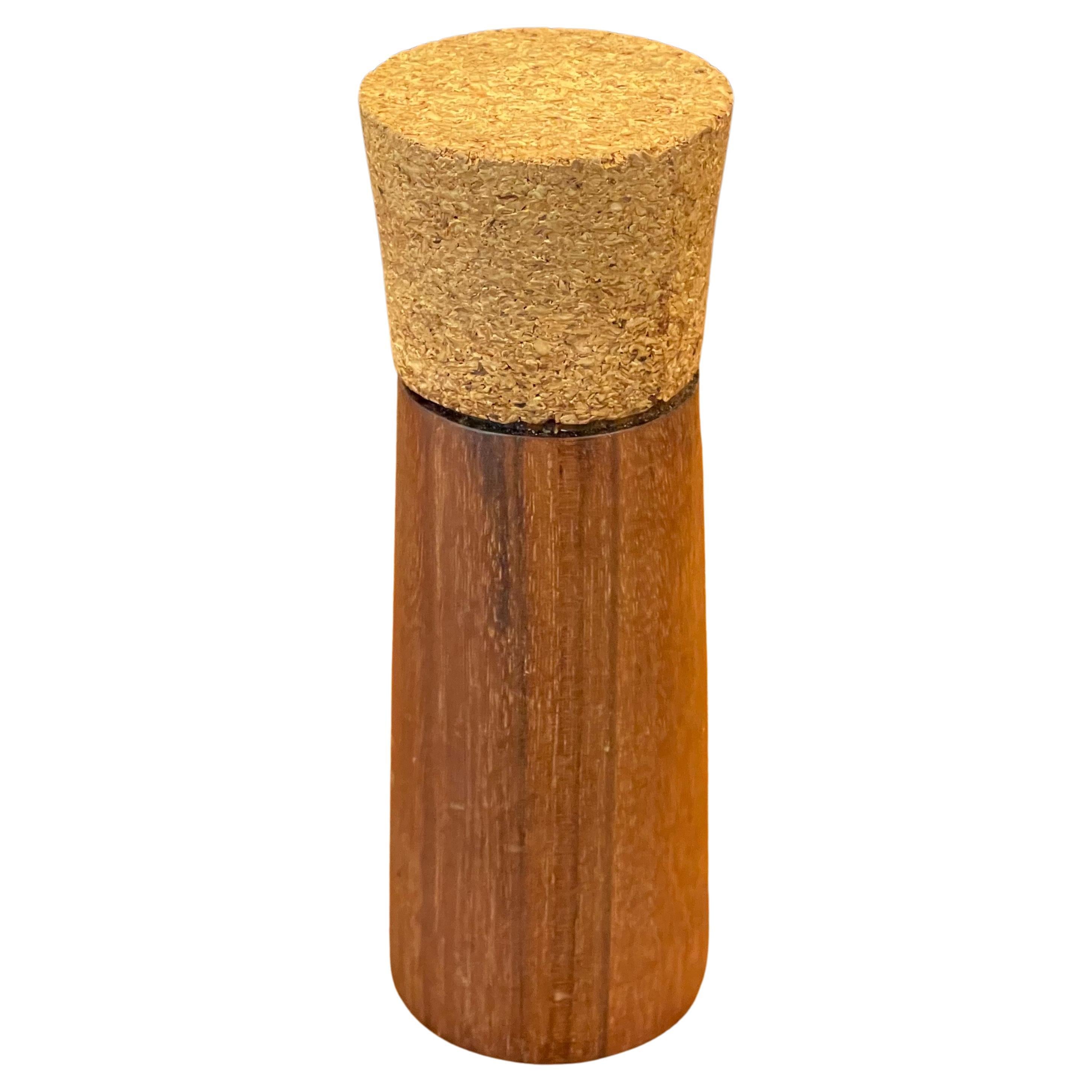 A unique MCM teak and cork peppermill, circa 1970s. The piece is in very good vintage condition and measures 2.5