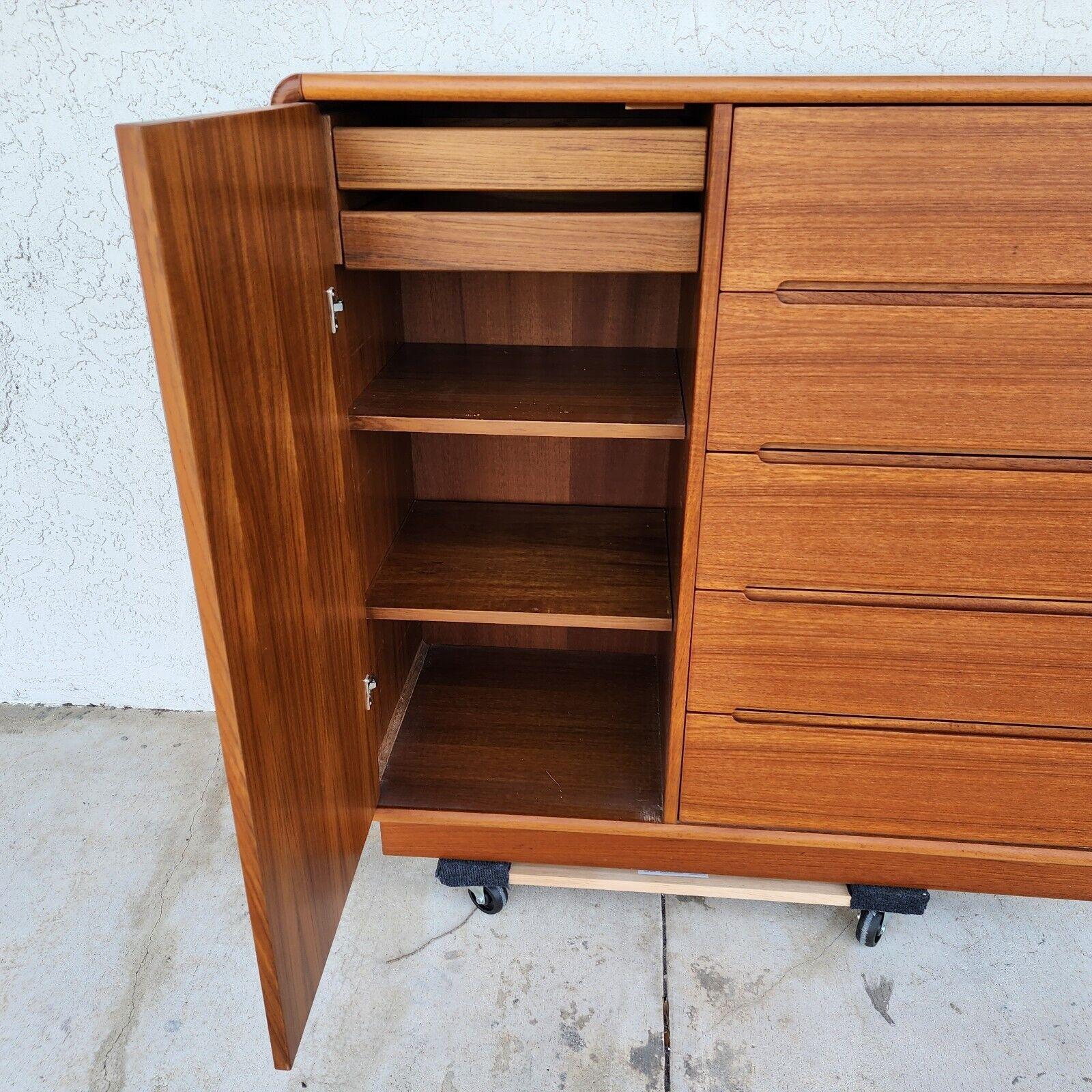 For FULL item description click on CONTINUE READING at the bottom of this page.

Offering One Of Our Recent Palm Beach Estate Fine Furniture Acquisitions Of A
MCM Teak Highboy Dresser Gentleman's Chest by Sun Cabinet Co
Drawers are clean, work