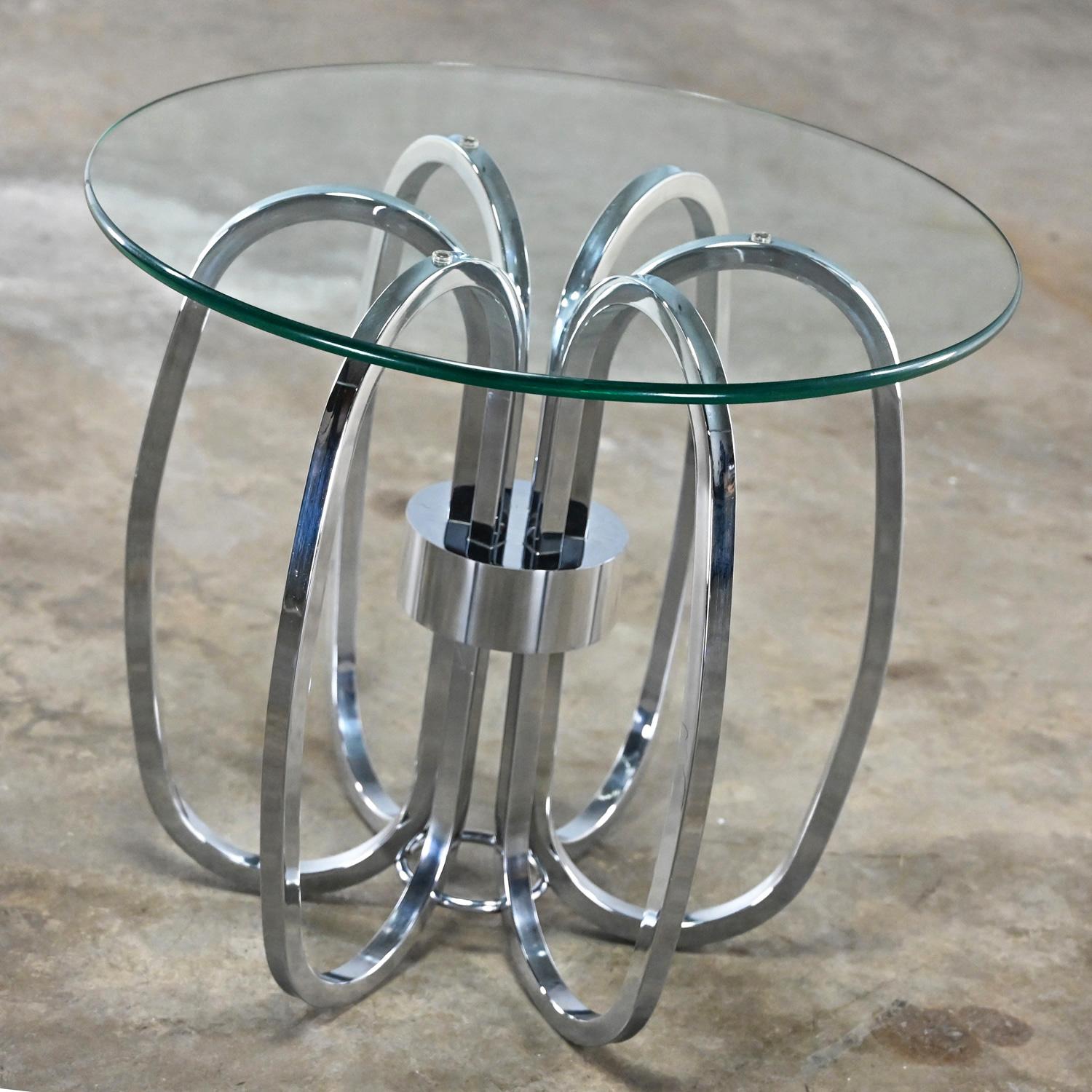 Marvelous vintage Mid-Century Modern to Modern end or side table with barrel shaped square chrome tube base & round glass top. Beautiful condition, keeping in mind that this is vintage and not new so will have signs of use and wear even if it has