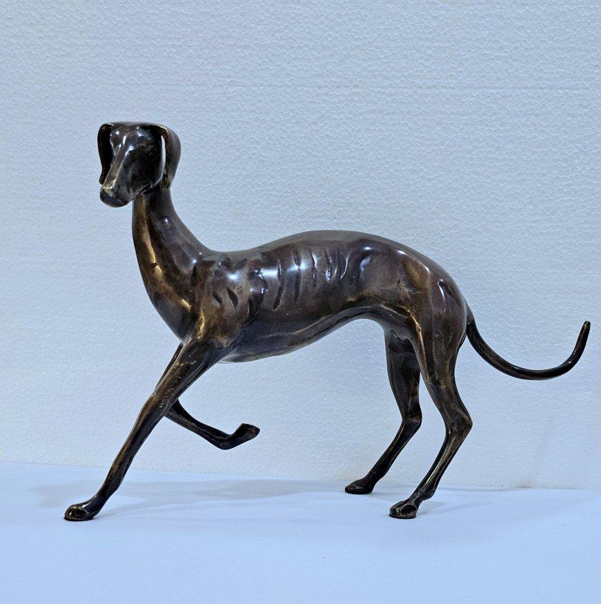 Eleven Inch Mid-Century Modern Brass Galgo / Greyhound Dog Sculpture.
*****NOTICE: Our 1stDibs shop will be taking a break soon, thus the temporarily lower price.*****
This handsome mid-century modern sculpture would make a great gift for the
