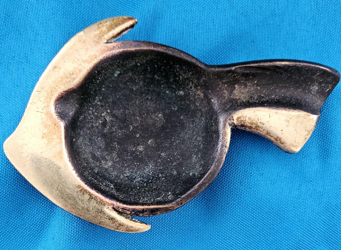 MCM / Vintage Brass (or Bronze?) Stylized Fish Shaped Ashtray / Cigarette Holder. 
UPDATE: Due to agreement with 1stDibs, we'll be staying through the end of the year.
Good vintage condition. We found no chips, cracks, or repairs. 
This unique