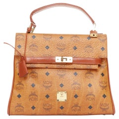 MCM Vintage Kelly, cognacfarben, Visetos-Monogramm, GHW-Drehverschluss, Handtasche mit Tragegriff