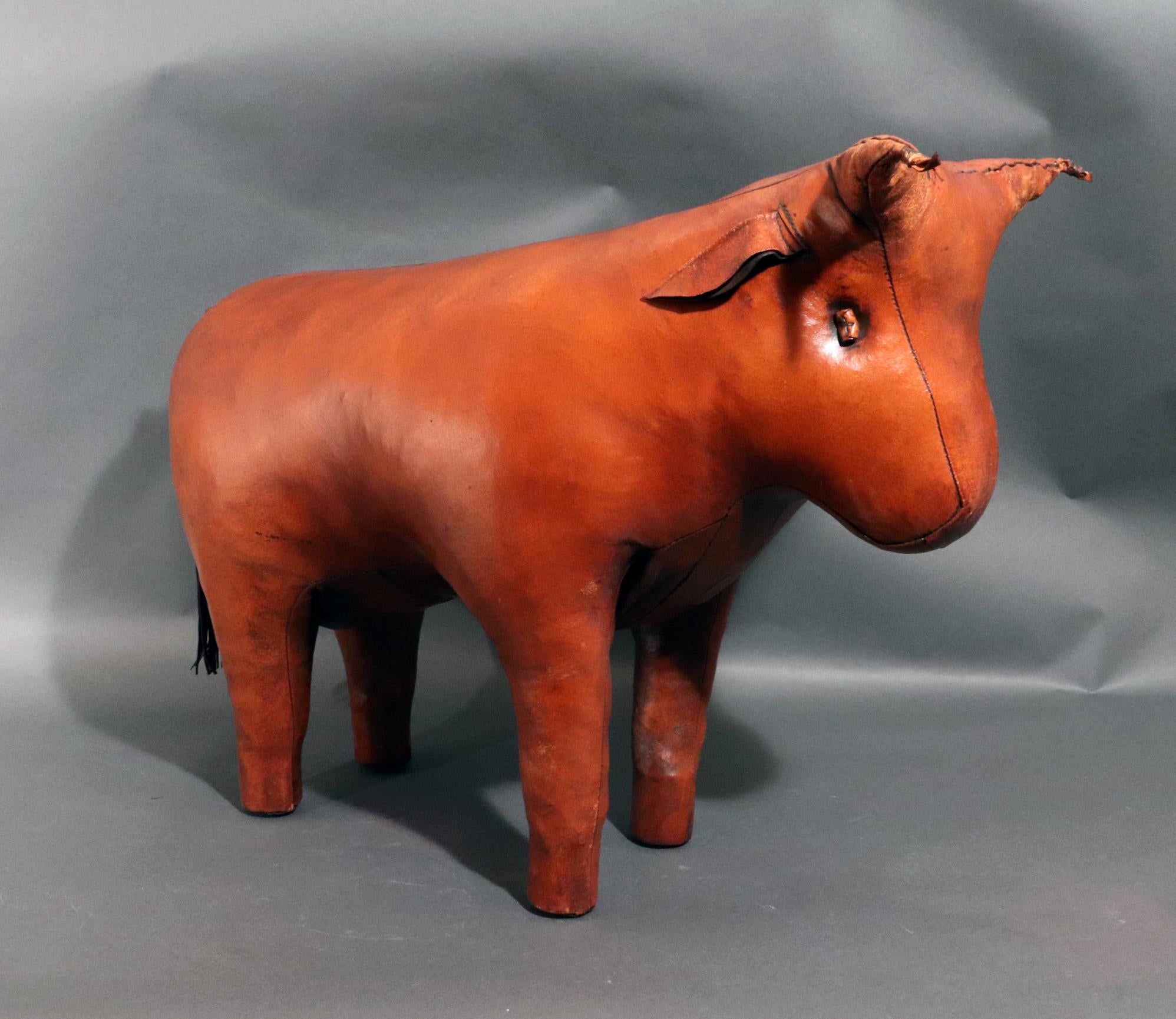 MCM Vintage Leather Bull,
Dimitri Omersa for Liberty of London,
The 1960-70s

The rare Dimitri Omersa leather footstool is designed in the shape of a bull in an usual light colored leather.  This is a rare subject and very unusual