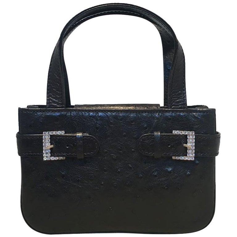 Mcm ostrich bag clearance