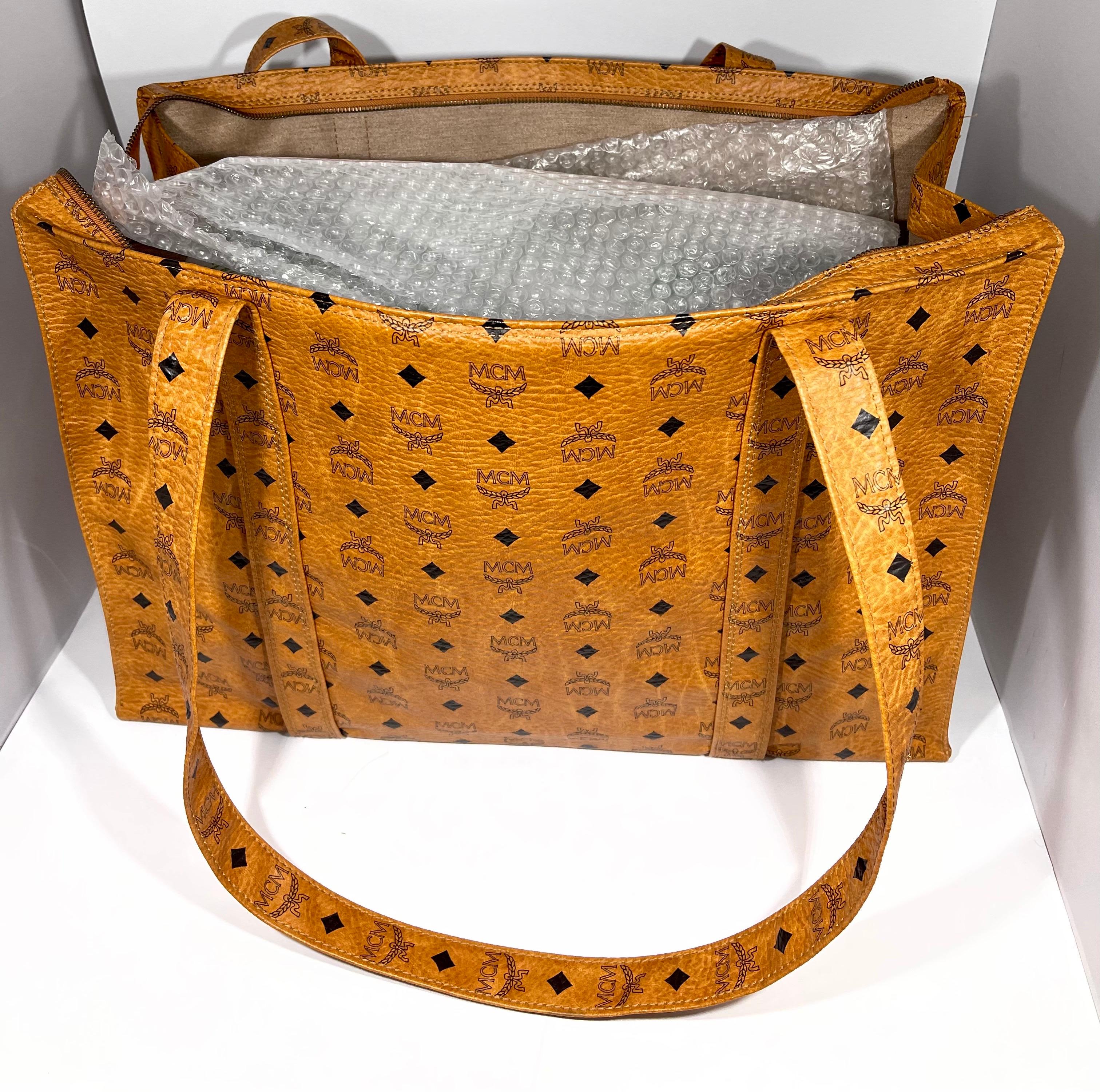 Women's or Men's MCM Visetos Leather Shoulder Bag/ Luggage bag Beiges PVC Serial # Q7465