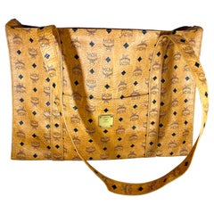 Sold at Auction: MCM MUNCHEN MONOGRAM LEATHER DUFFEL LARGE BAG