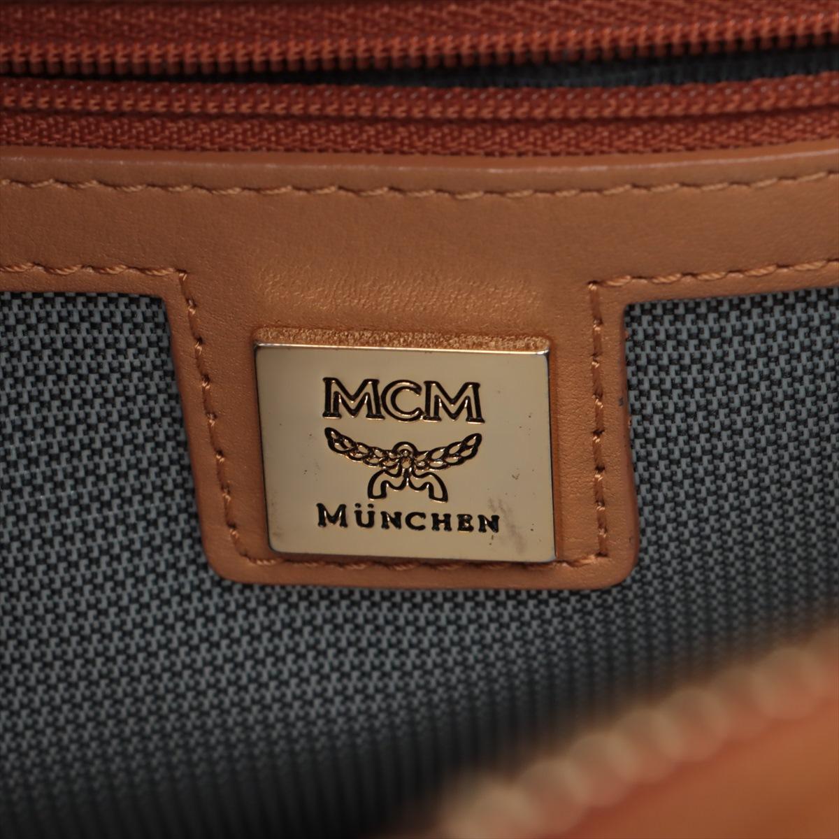 Zaino MCM Visetos Stark con borchie laterali Cognac in vendita 9