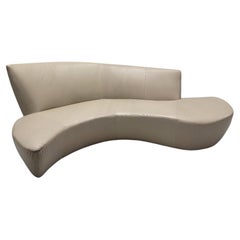 Mid-Century Modern Serpentine Sofa Newly Upholstered in Leather