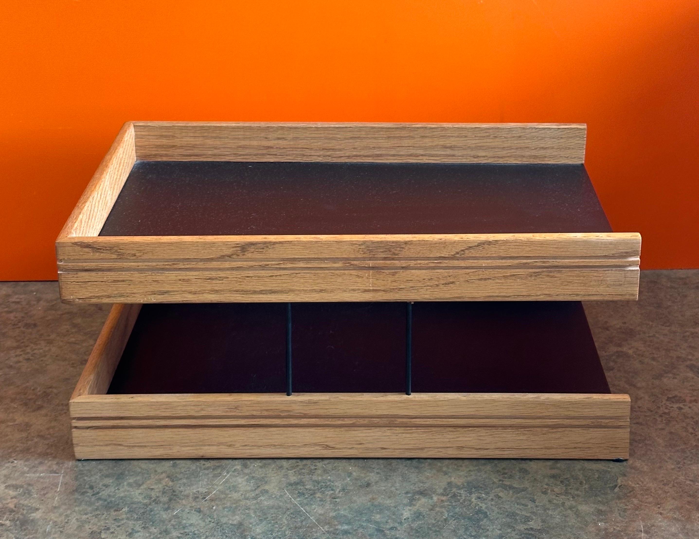Very cool and functional MCM walnut and nauhgahyde double letter tray by OPCO, circa 1970s. The tray is in very good vintage condition and measures 15.5