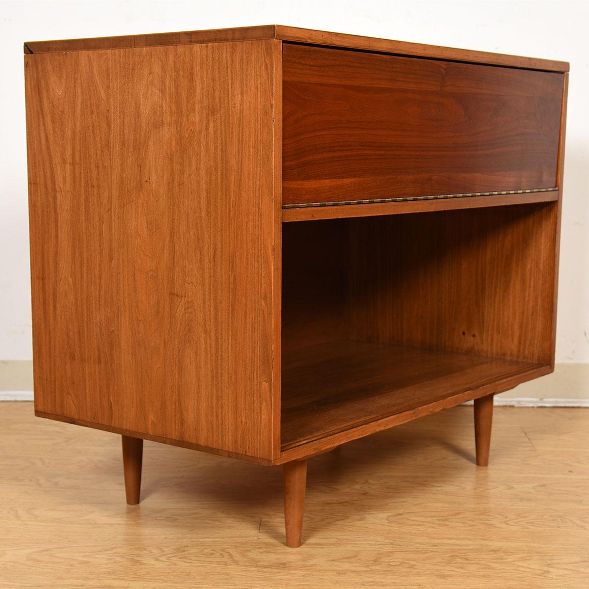 MCM Walnut Flip-Down Front Media Cabinet with Flip-Up Top

Additional Information:
Material: Walnut
Featured at Kensington:
Wonderful, space saving media cabinet has space for your components and vinyl collection.
Components are kept dust-free