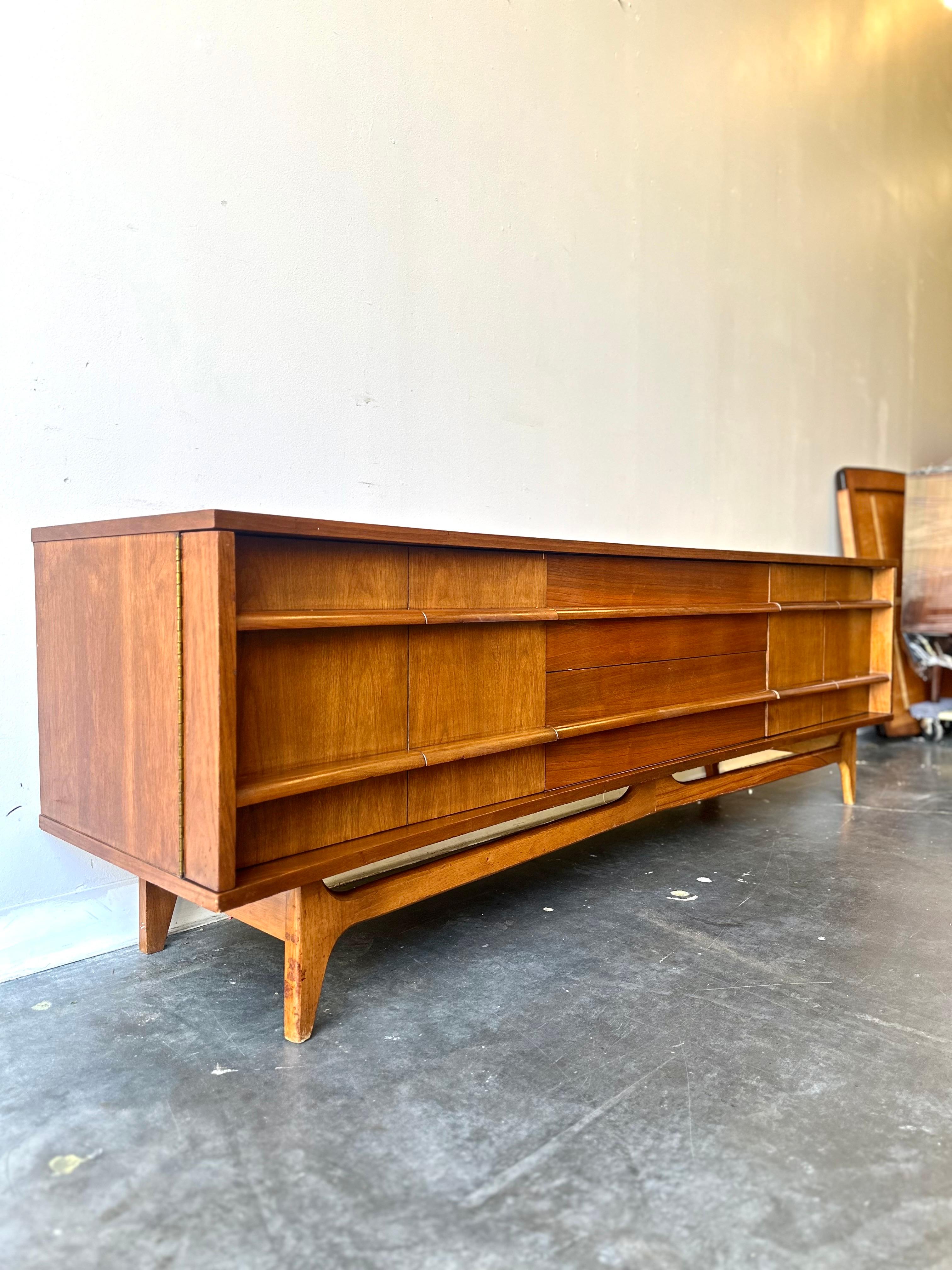 Mid-Century Modern MCM Walnut low sculptural credenza by young , circa 1960