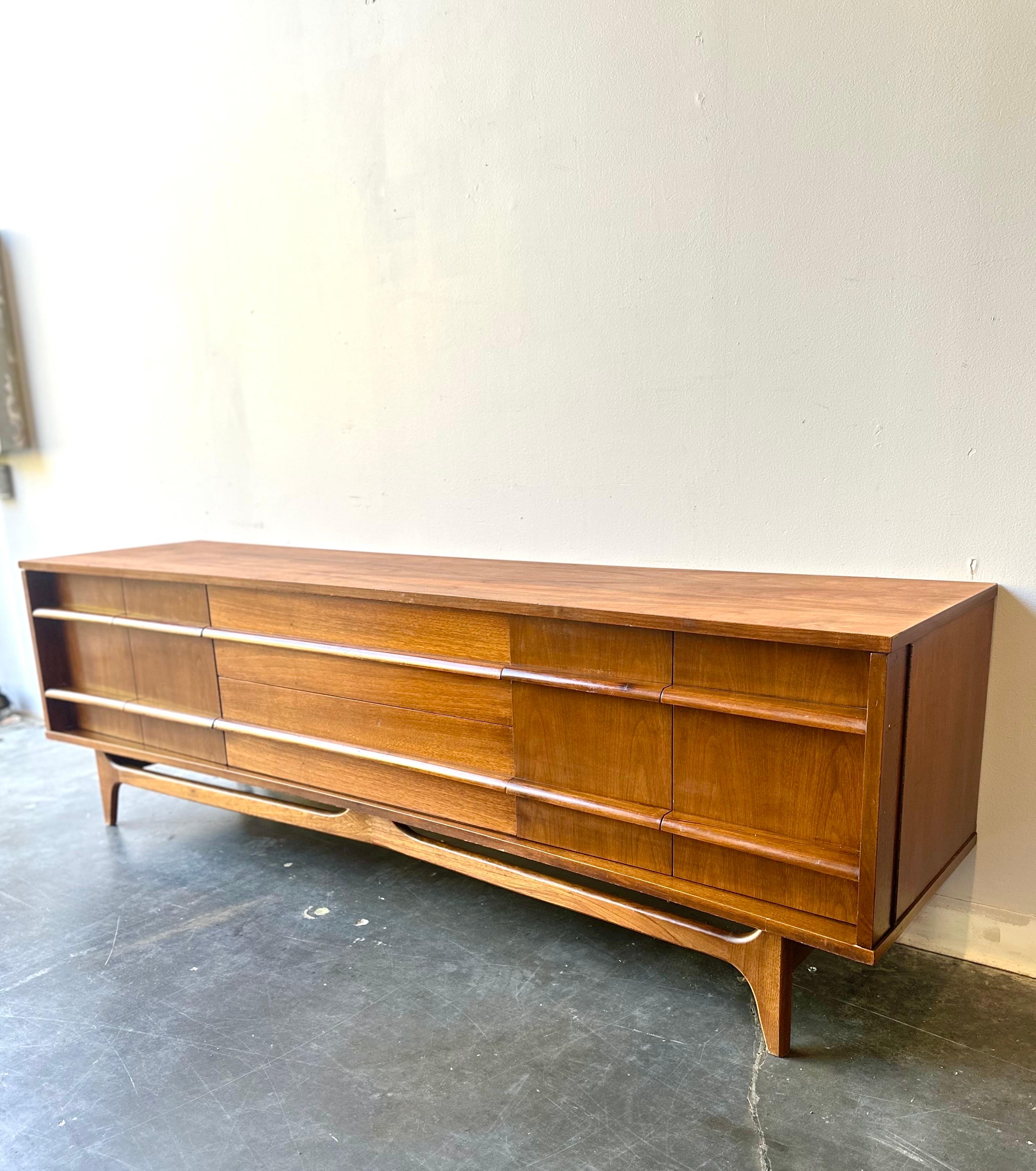 Mid-20th Century MCM Walnut low sculptural credenza by young , circa 1960