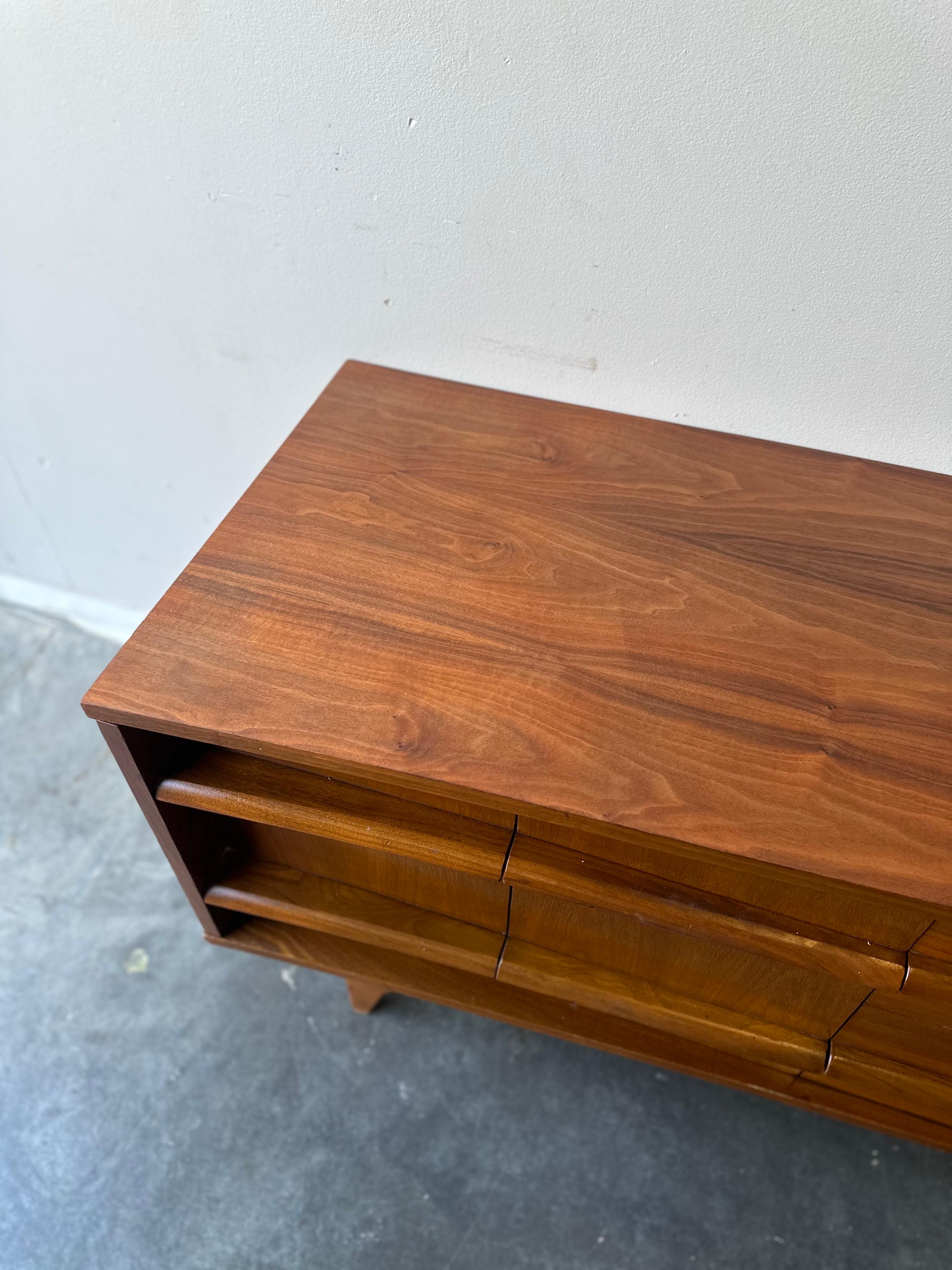 MCM Walnut low sculptural credenza by young , circa 1960 1