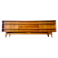 MCM Walnut low sculptural credenza by young , circa 1960
