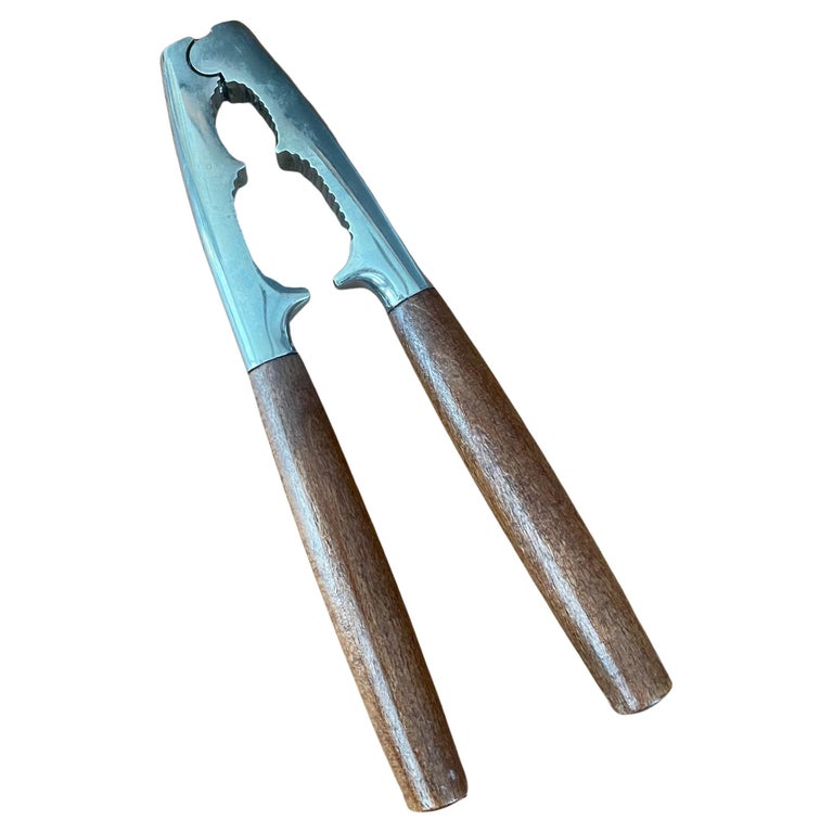 MCM Walnut and Stainless Steel Nutcracker For Sale at 1stDibs