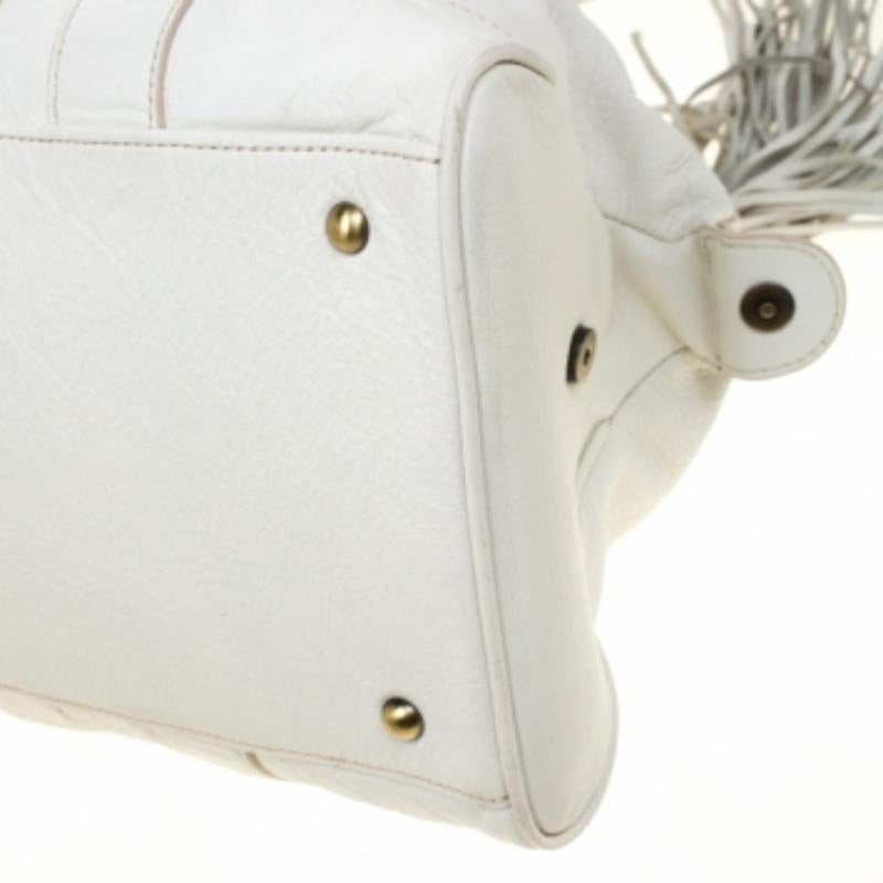 MCM Cartera con borla de piel blanca en venta 2