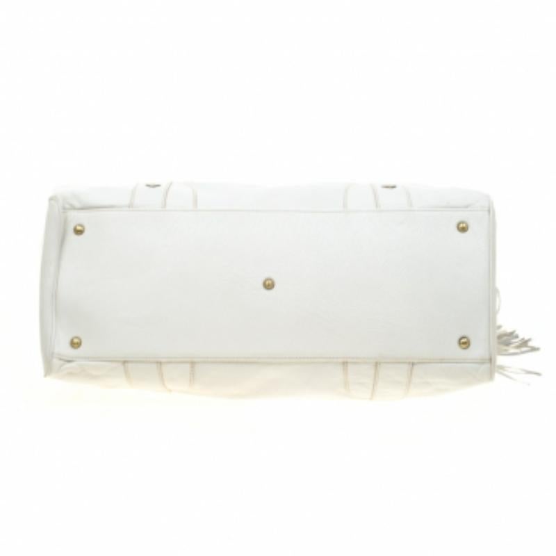 MCM Cartera con borla de piel blanca en venta 4