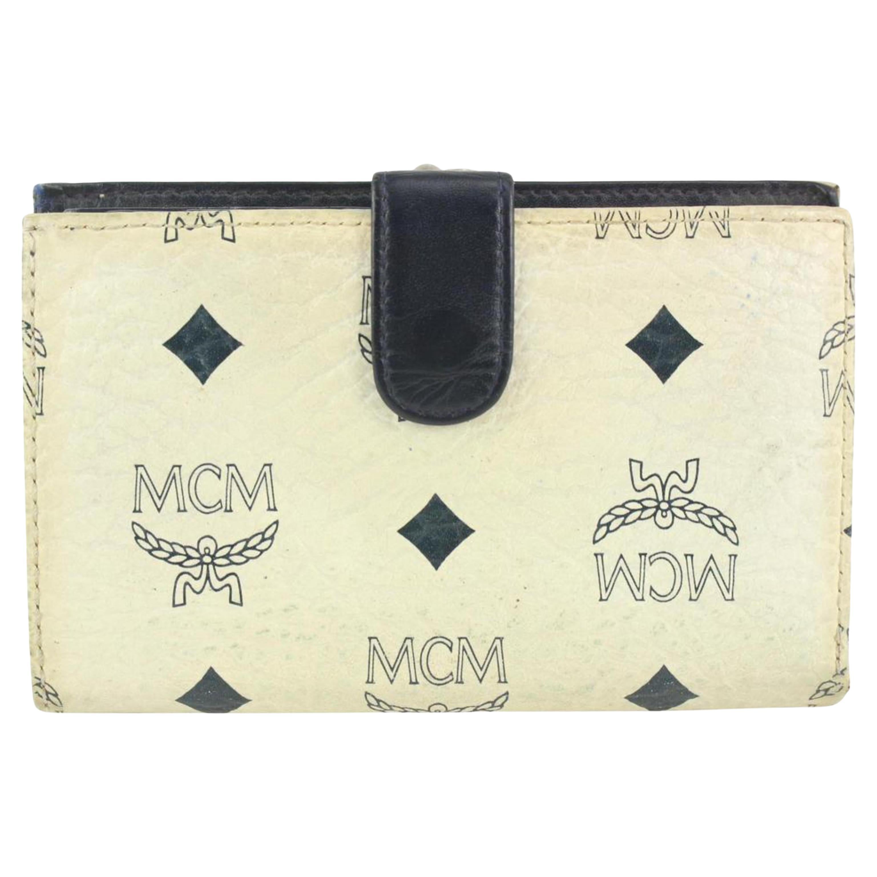 MCM Tan Monogram Logo Leather Passport Holder Wallet at 1stDibs mcm