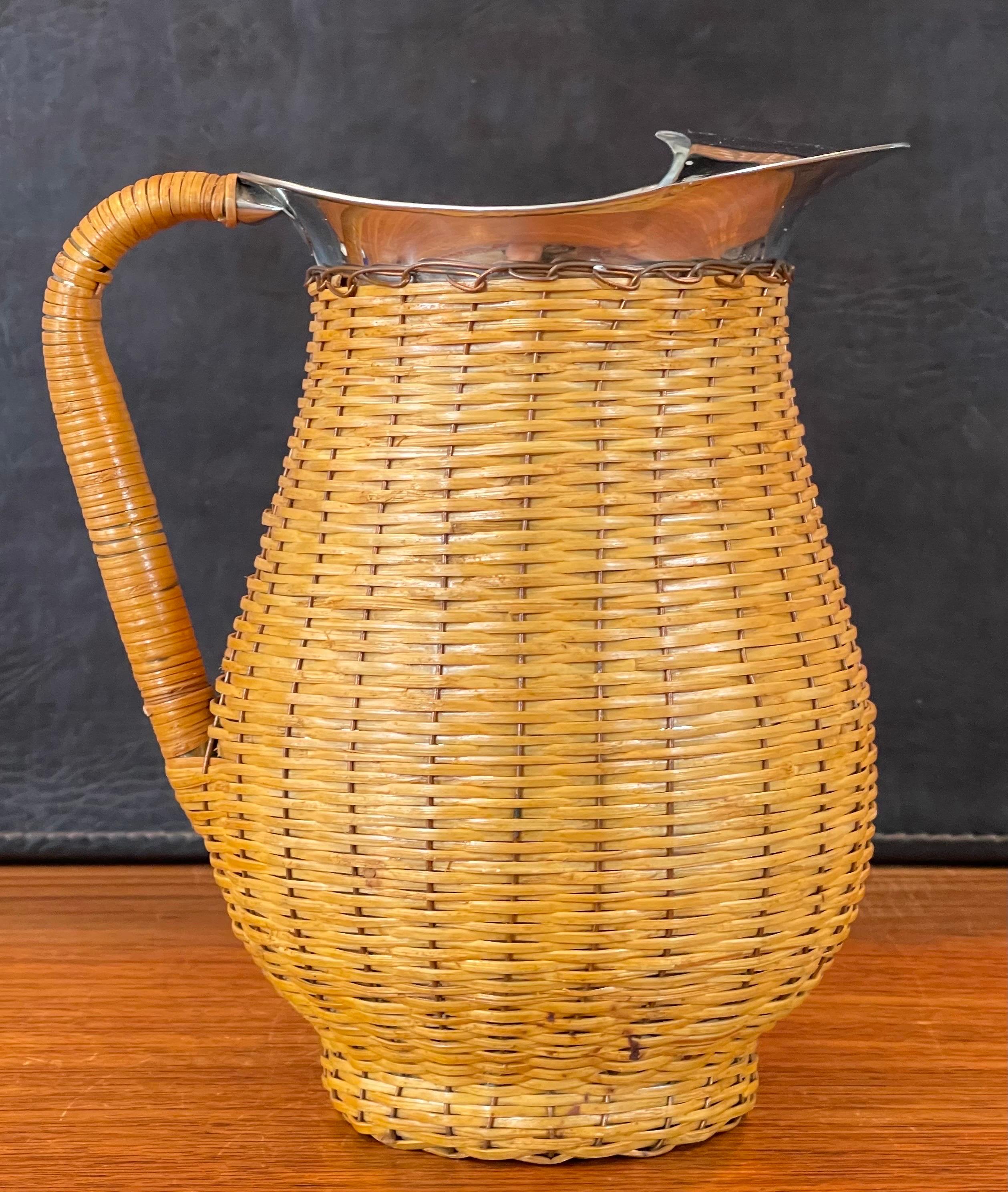 20th Century MCM Wicker Wrapped Stainless Steel Pitcher For Sale