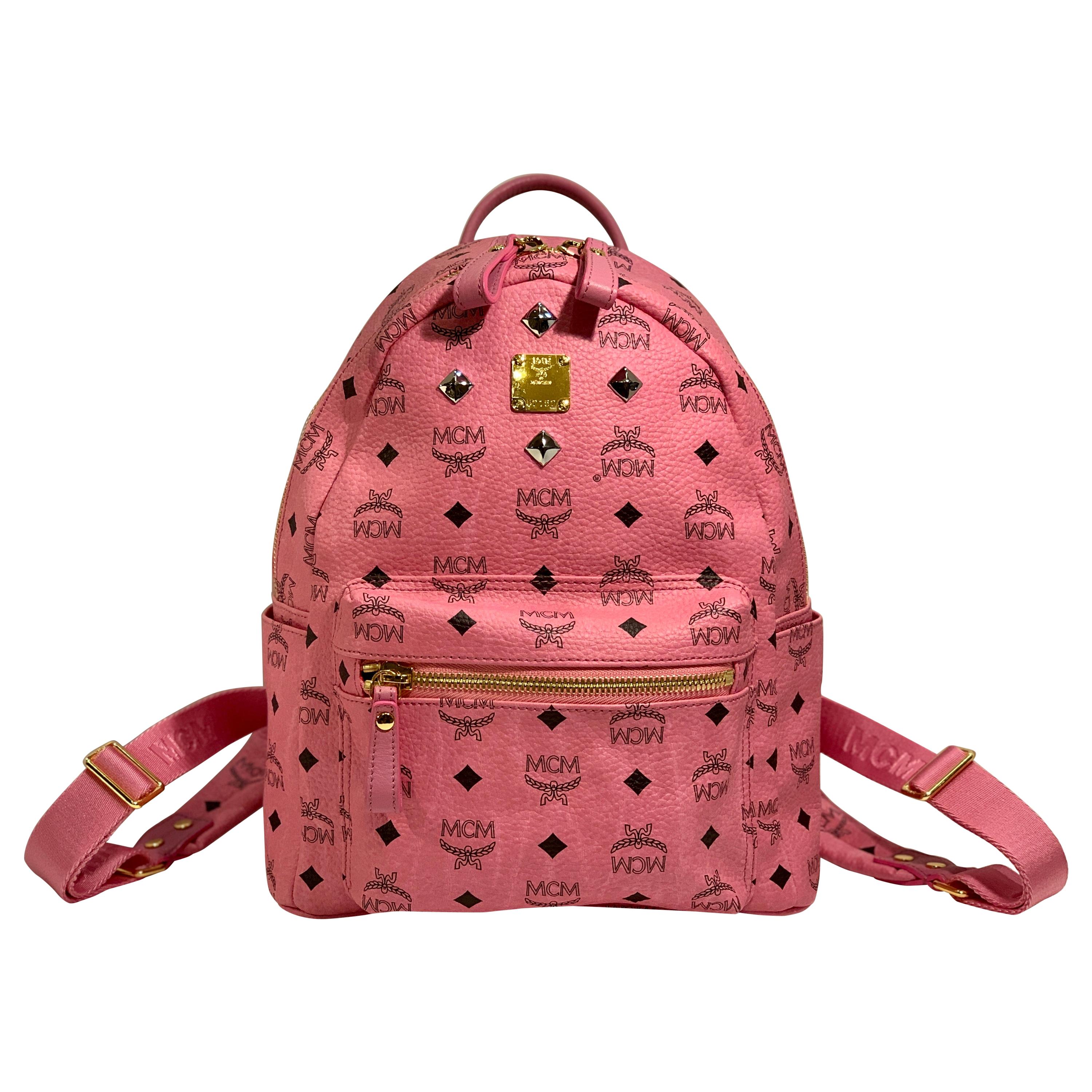 MCM Worldwide Medium Stark Backpack Pink and Black Visetos with Gold Studs  For Sale at 1stDibs | mcm pink backpack, mcm backpack pink, mcm bookbag pink