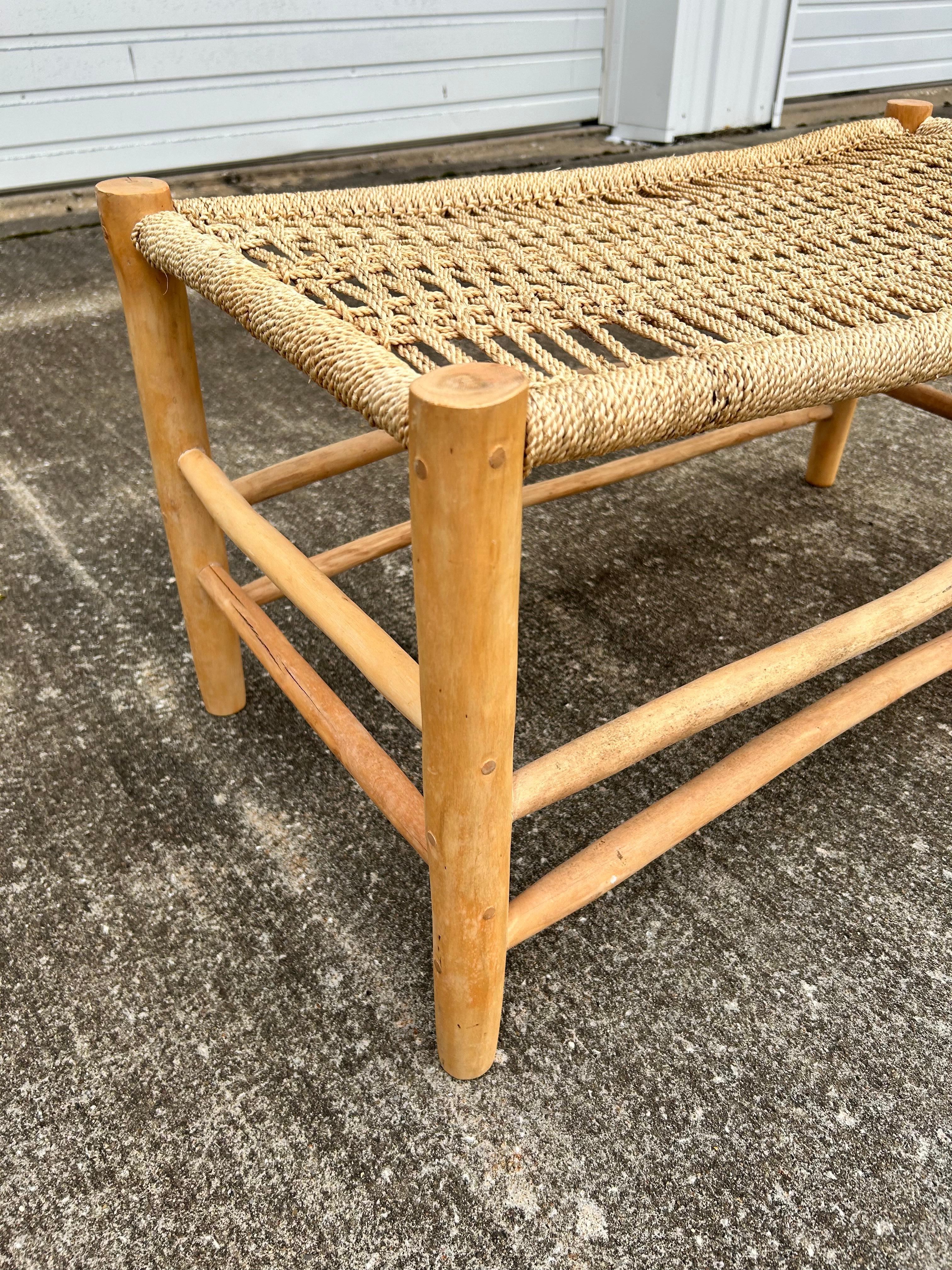 MCM Woven Bench Seat in Style of Charlotte Perriand, crafter from solid pine and woven straw rush. It is a perfect small bench for an entry way or decorative piece for your home.