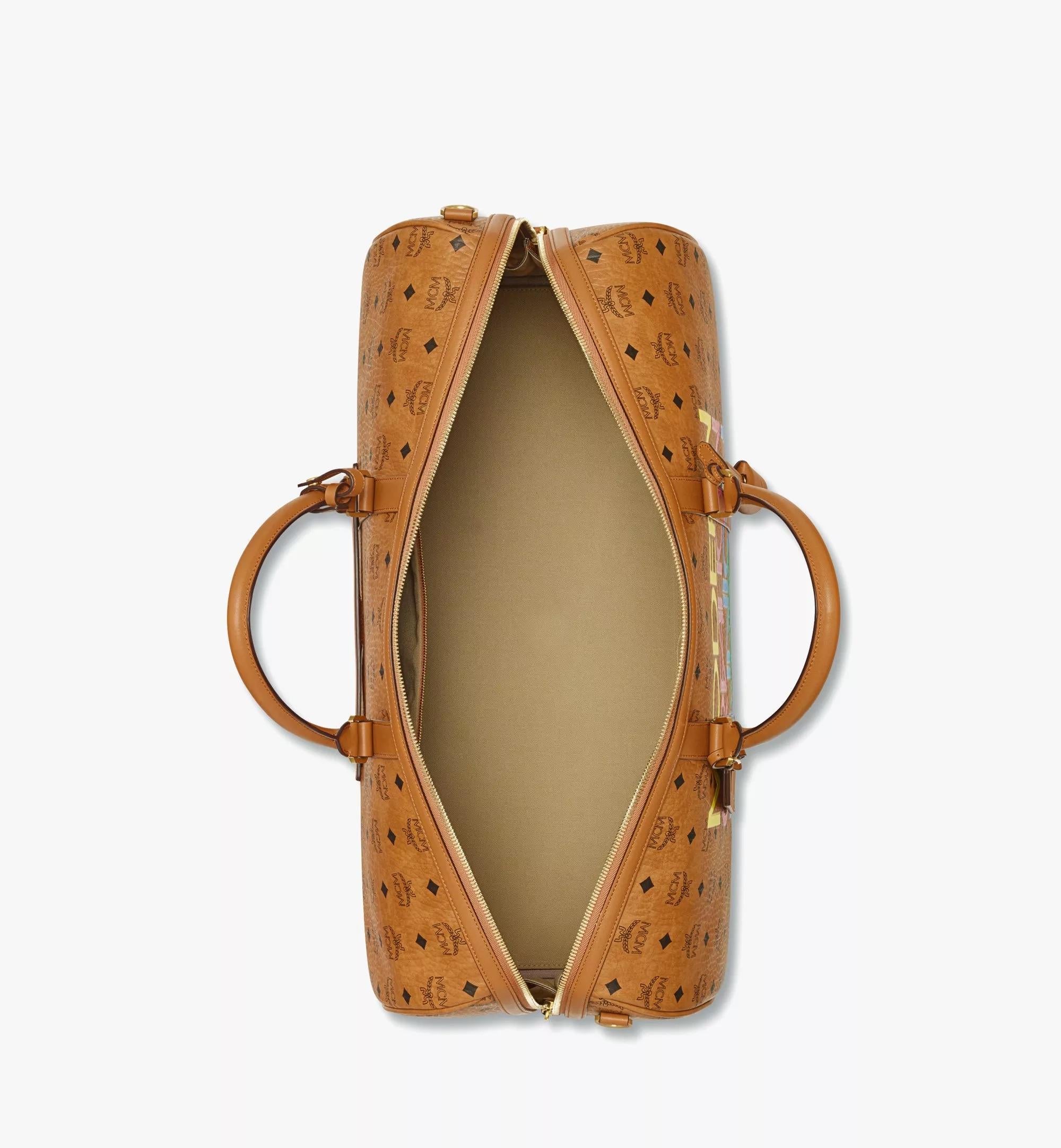MCM X HONEY DIJON OTTOMAR WEEKENDER IN VISETOS

A multi-colored 