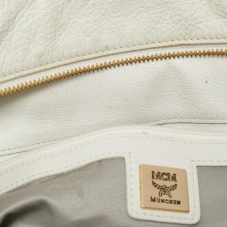 Bolso con cremallera MCM en piel estampada pitón amarillo/negro Negro en venta
