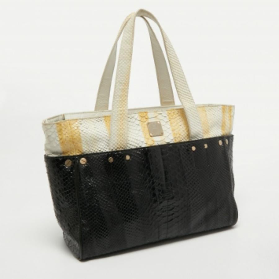 Bolso con cremallera MCM en piel estampada pitón amarillo/negro en venta 4