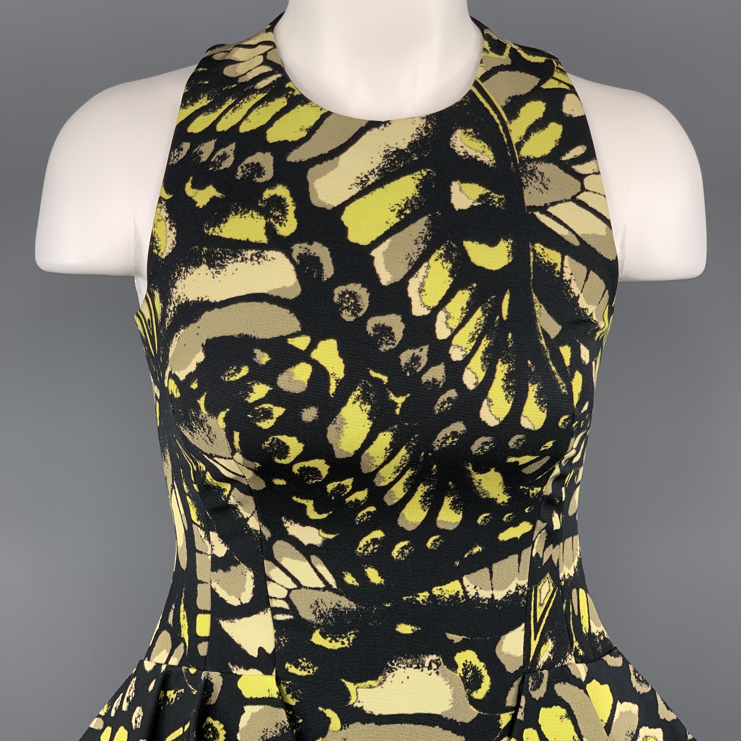 MCQ by ALEXANDER MCQUEEN dress comes in black and lime green butterfly wing print faille with a halter neckline, peplum sides, and AA line skirt. Made in Italy.

Excellent Pre-Owned Condition.
Marked: IT 38

Measurements:

Shoulder: 8.5 in.
Bust: 34