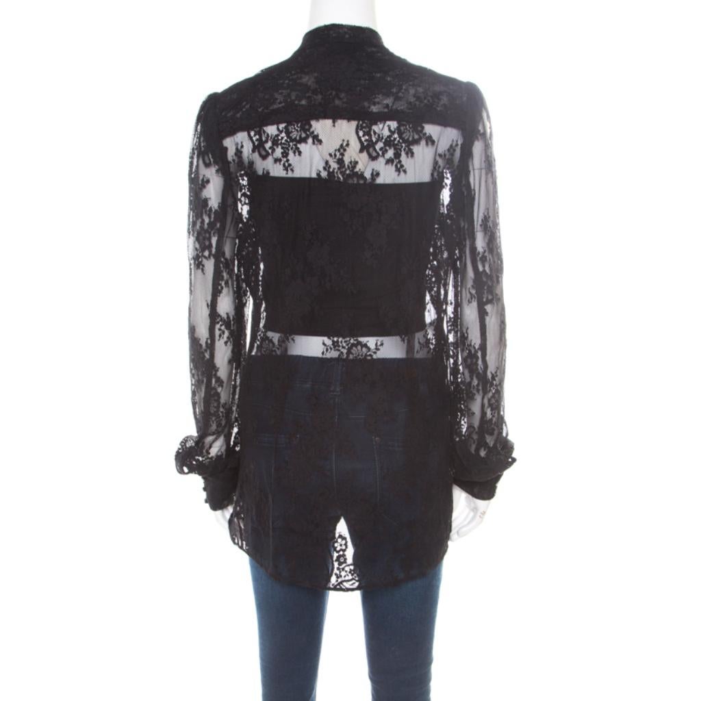 This black blouse from McQ By Alexander McQueen deserves all your attention! It is made of blended fabric and styled with a chinese collar and long cuffed sleeves. Sure to lend you a great fit it flaunts a floral pattern all over.

Includes: The