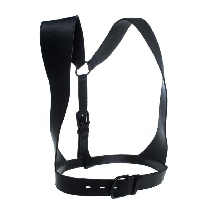 Your esteemed wardrobe collection needs a good harness belt and what better than this fabulous McQ by Alexander McQueen creation! The black harness belt is crafted from leather and features a buckled waist strap and dual shoulder straps that are