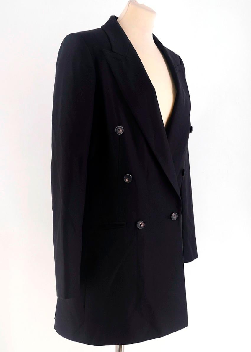McQ by Alexander McQueen Black Tux Blazer 

- Black Tux Blazer
- Double Breasted, Long Sleeved 
- Peak Lapel, Padded Shoulders
- Buttoned down center front 
- Slip pocket at chest, sides and inner side 

Please note, these items are pre-owned and