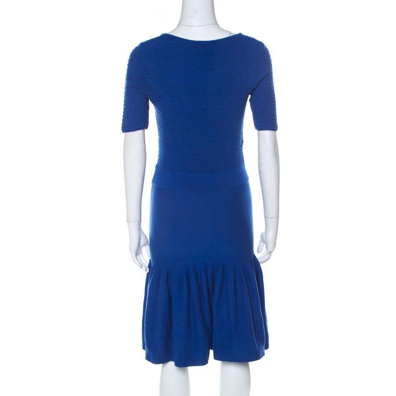 The tailoring of the attire is definite and exquisite making it another perfect creation of McQ by Alexander McQueen. Offering style and grace, this blue dress is nothing but pure elegance. Designed with short sleeves and a cutout detail, this dress
