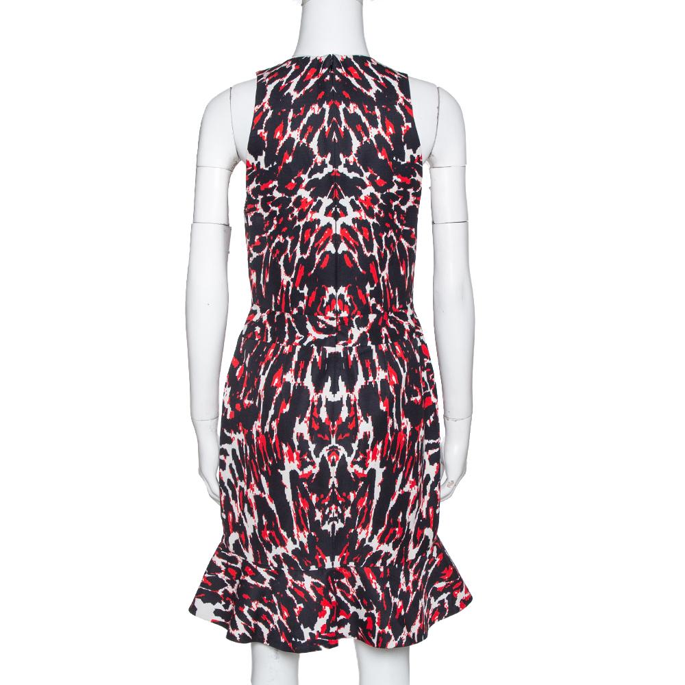 Sewn to offer a flawless fit, this McQ by Alexander McQueen dress will certainly adorn you with style. Made from a fabric blend, its figure-hugging bodycon design features a ruffle hem, and prints spread all over. The prints in red, black and white
