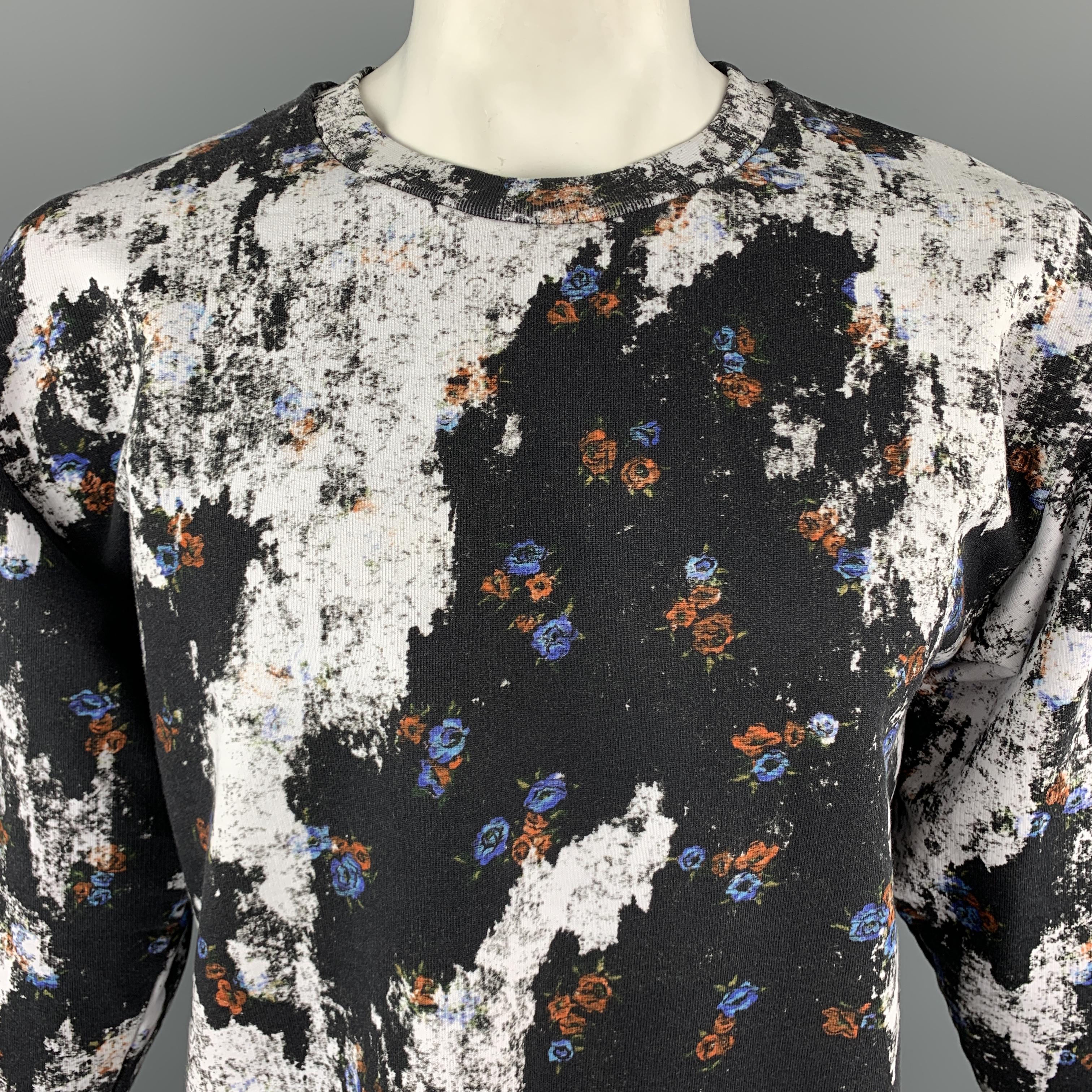 MCQ by ALEXANDER MCQUEEN Sweatshirt comes in black and white tones in a floral distressed print cotton material, with a crewneck and ribbed cuffs and hem. 

Excellent Pre-Owned Condition.
Marked: L

Measurements:

Shoulder: 21 in. 
Chest: 44 in.