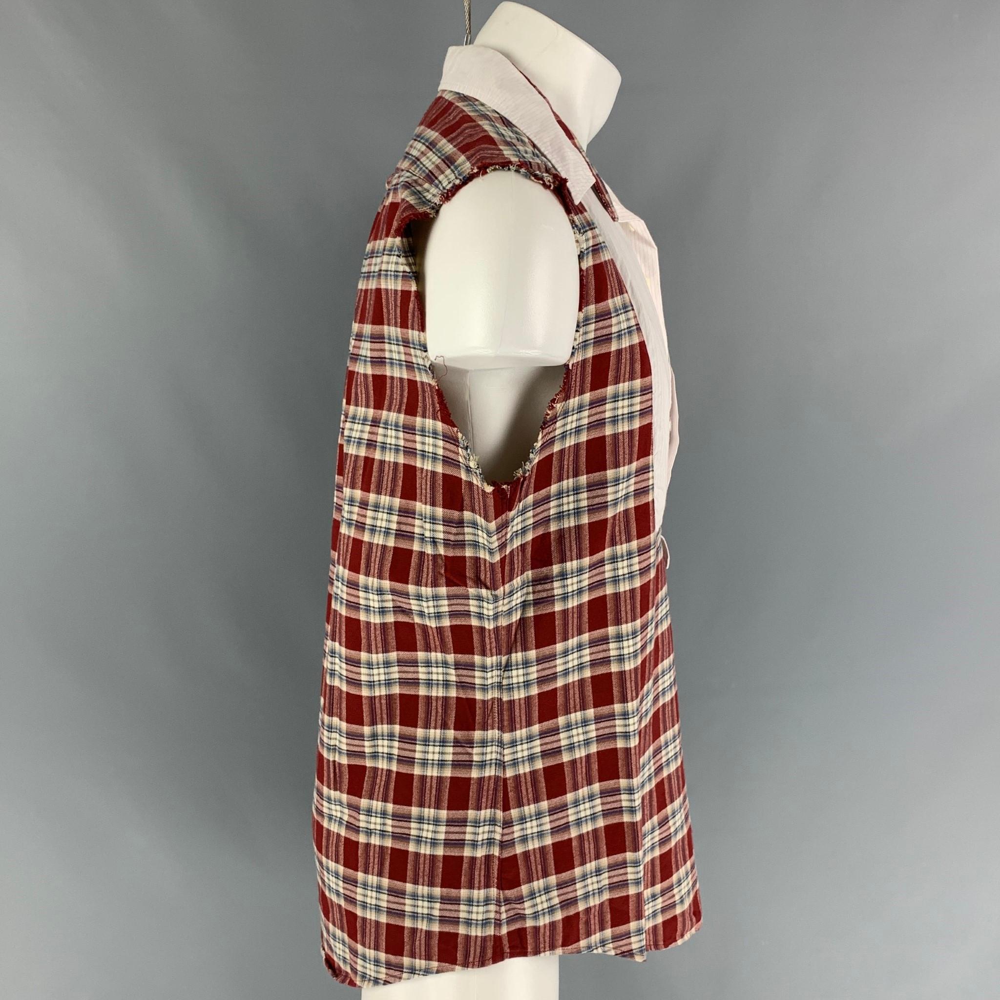 MCQ by ALEXANDER McQUEEN shirt comes in a burgundy & white plaid cotton featuring a sleeveless style, raw edge, layered, and a buttoned closure. Made in Italy. 

Very Good Pre-Owned Condition.
Marked: 48

Measurements:

Shoulder: 17 in.
Chest: 40