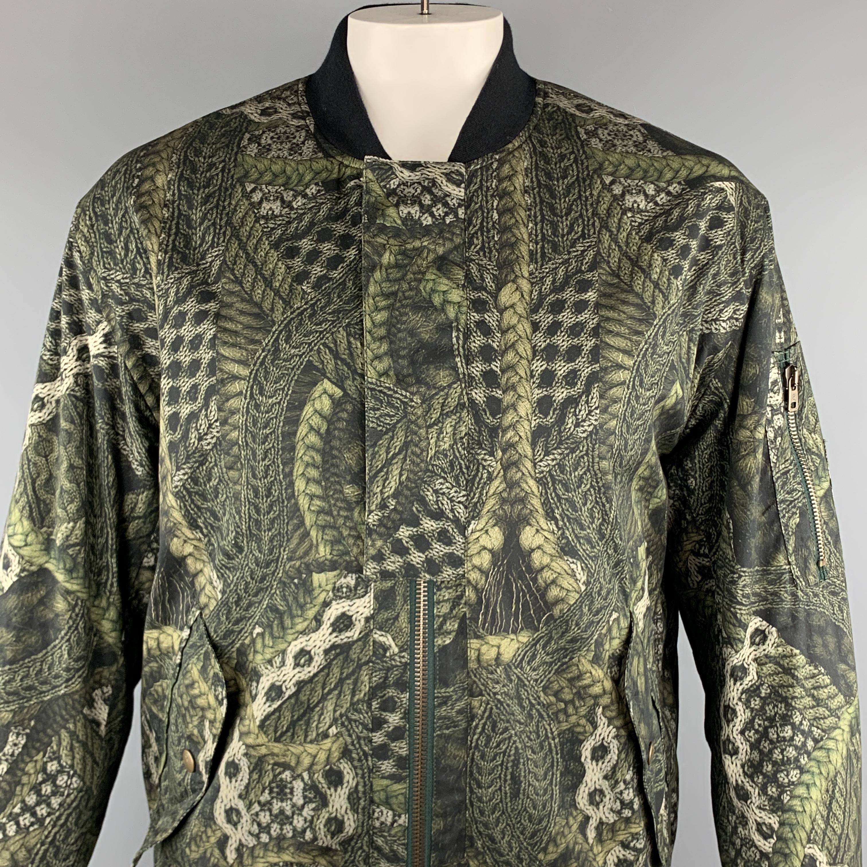 MCQ by ALEXANDER MCQUEEN Jacket comes in a olive print cotton / elastane featuring a bomber style, sleeve patch pocket details, and a full zip closure. Made in Romania

Excellent Pre-Owned Condition.
Marked: IT 56

Measurements:

Shoulder: 21.5 in.
