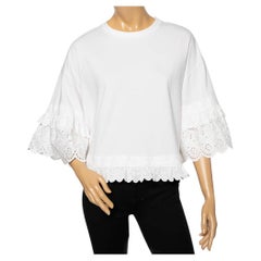 McQ by Alexander McQueen Camiseta blanca de algodón con ribete de ojales y volantes S