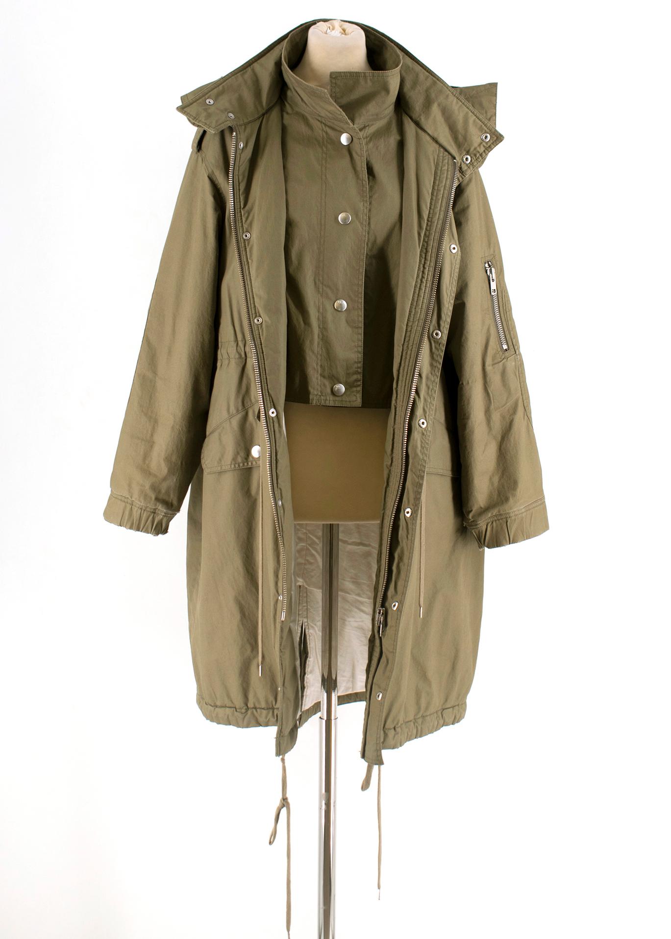 McQ Khaki Convertible Trench Coat

- Can be styled two ways
- Heavily insulated
- Adjustable at waist and bottom
- Detachable hood
- Pockets, zippers, functioning and in good condition

Please note, these items are pre-owned and may show signs of