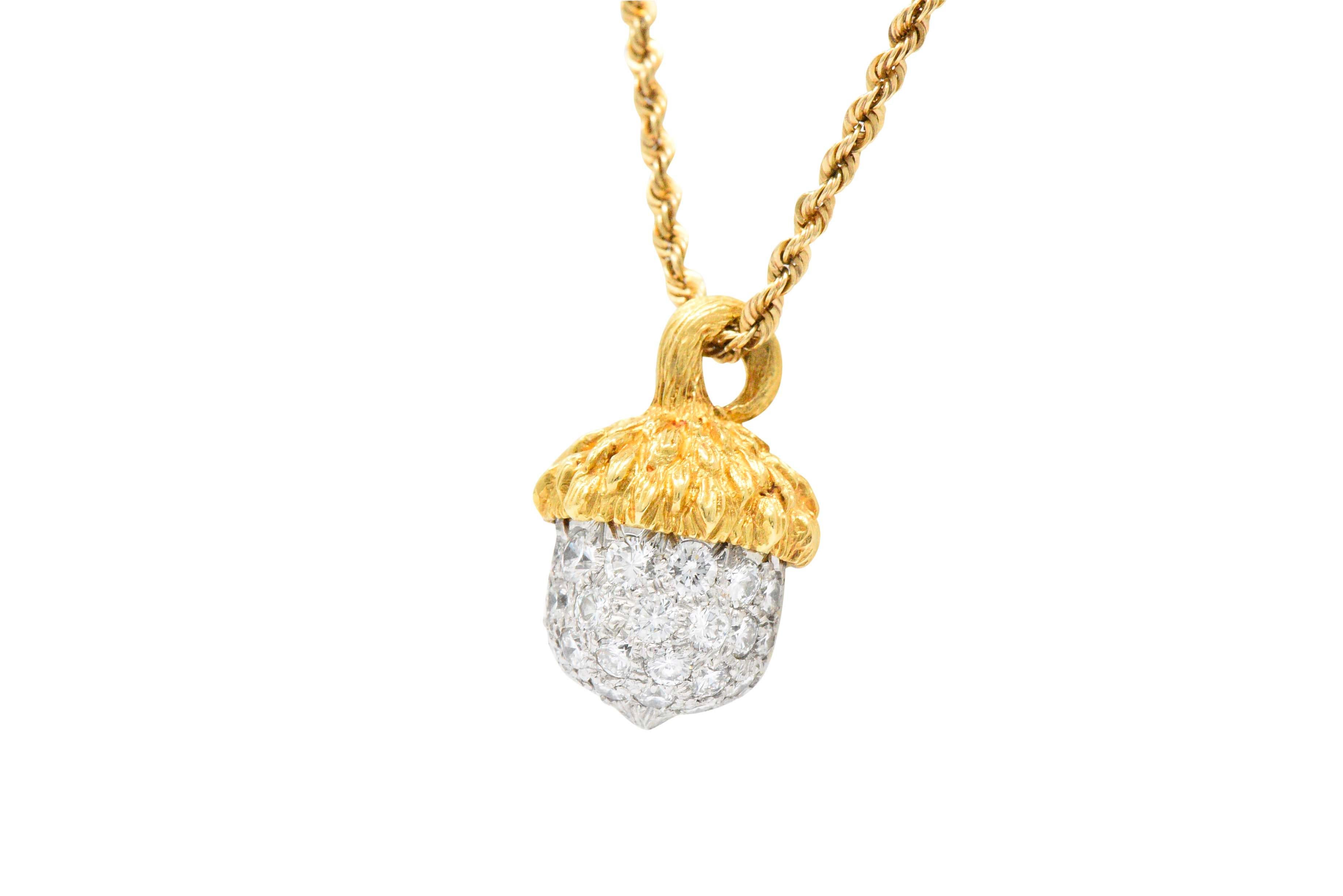 Designed as an acorn with pavé set with round brilliant cut diamonds, weighing approximately 1.20 carats total, G/H color and VS to SI clarity
With a textured gold cap
On a 14 karat twisted rope chain with barrel clasp
The acorn stamped with