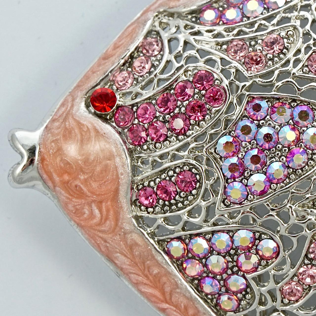 Wonderful large vintage silver tone and pink enamel fish brooch, with sparkling pink aurora borealis, pale pink and rose pink rhinestones. Measuring length 8cm / 3.1 inches by width 9cm / 3.5 inches. The brooch is in very good condition, and is