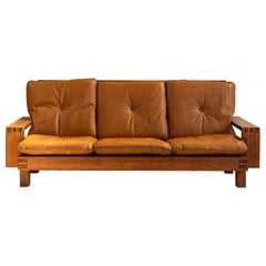Mdcentury walnut sofa by Giuseppe Rivadossi for Officina Rivadossi