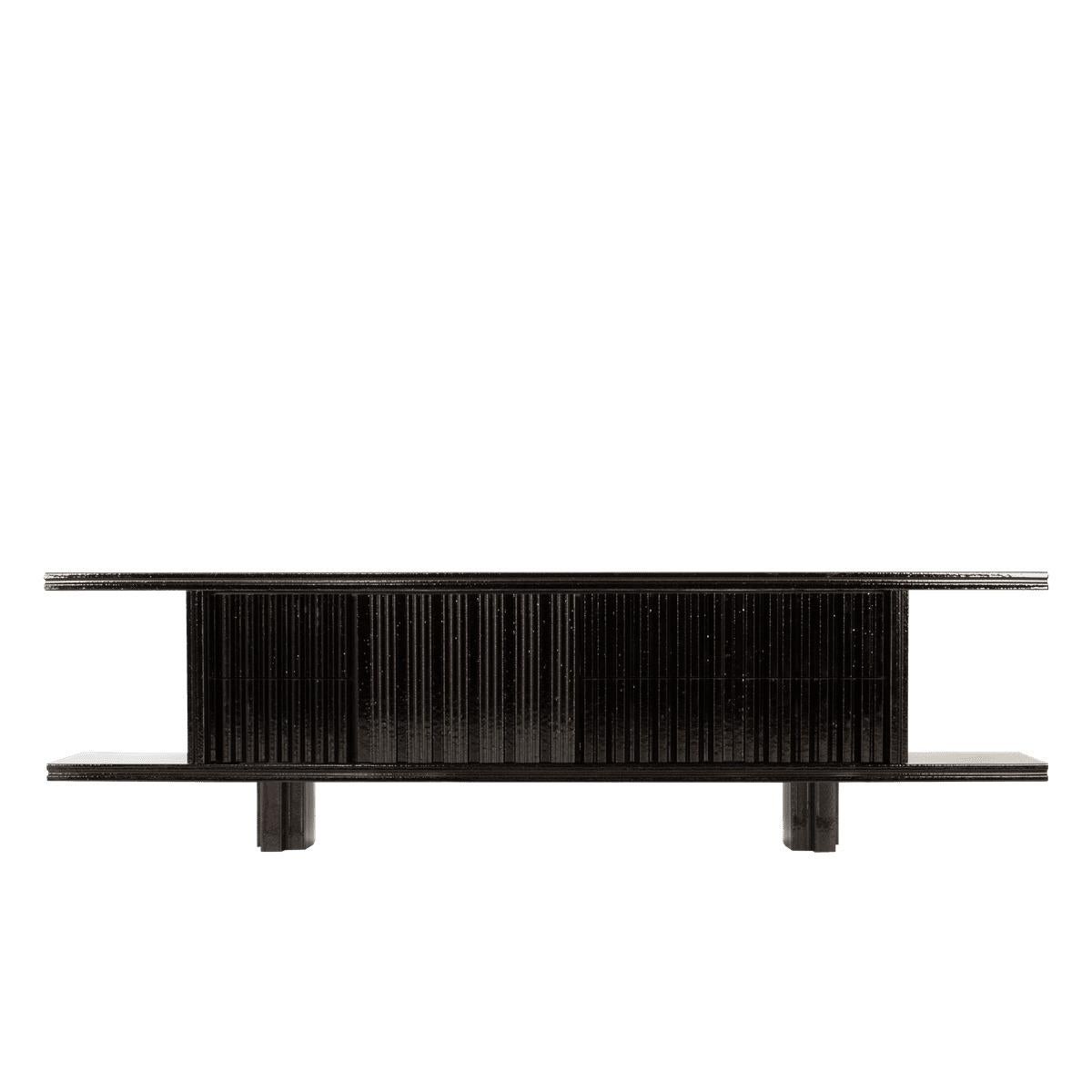 MDF and Melamin Black Marino Sideboard by Pulpo
Dimensions: W 35 x D 210.7 x H 57.5 cm
Materials: MDF + melamin finish.

The Marino sideboard by Studio speziell® is characterized with its extruded ceramic form and a raw, glossy glaze in the deepest