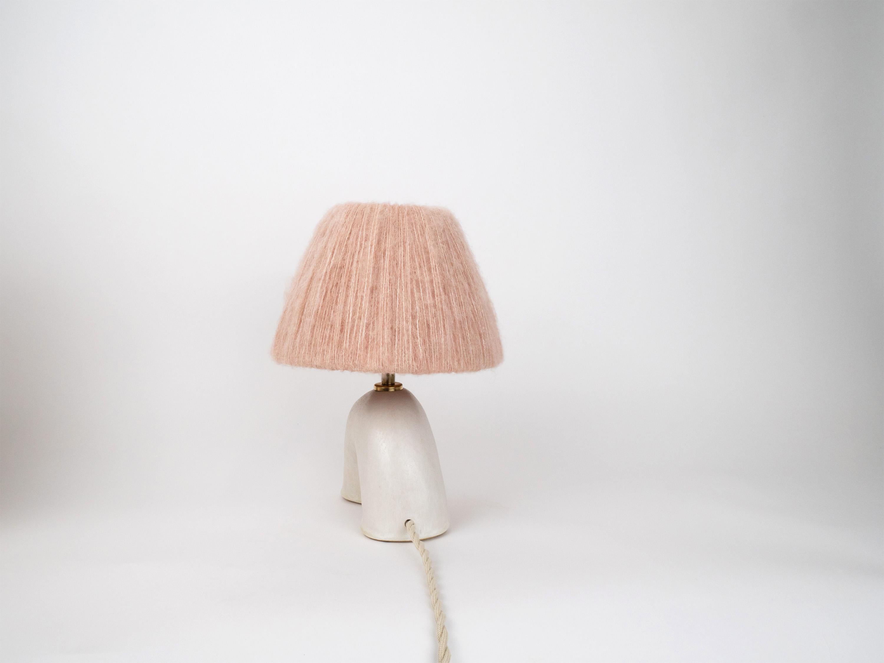 White lamp base with a satin finish paired with a Sand Pink wool lampshade.

Lamp & Shade: H27 x W20 x D20 cm

Bulb NOT included
Recommended bulb fitting: E27/26 
Recommended bulb type: Mini Globe LED

The estimated processing time is 2 weeks from