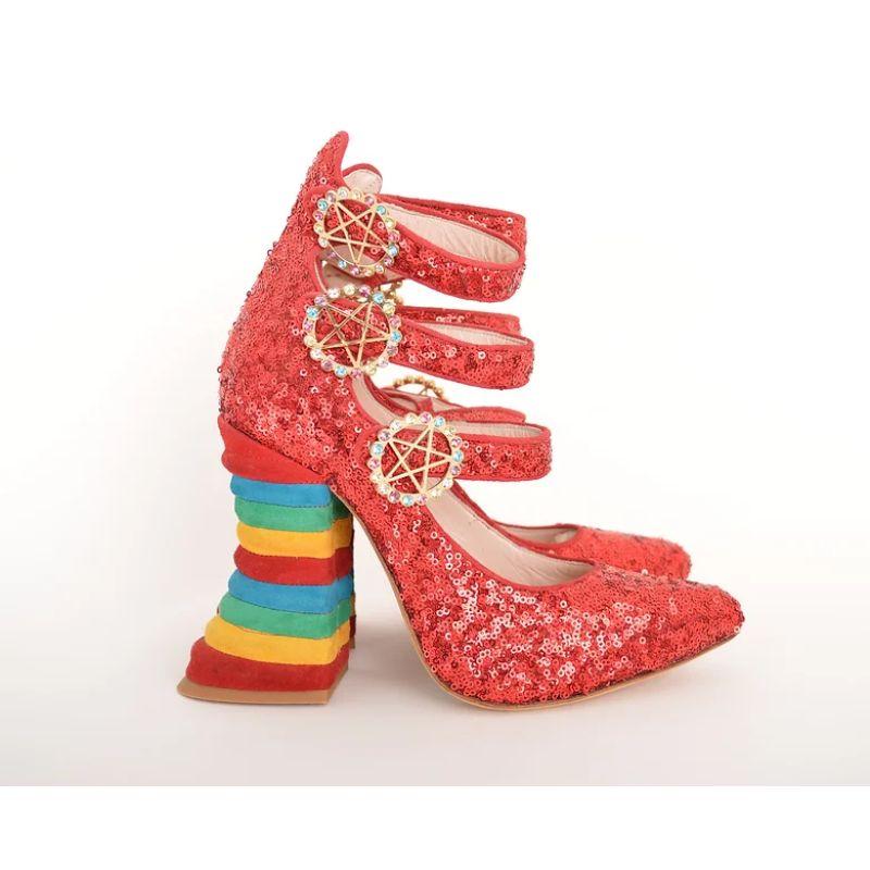 A rare pair of Mary Jane heeled shoes by short-lived label MEADHAM KIRCHHOFF (by Edward Meadham & Bejamin Kirchhoff) for Topshop Autumn/Winter 2013.  

Features:
Rainbow suede heel
Diamonte pentagram detailed press stud buckles
Leather lined