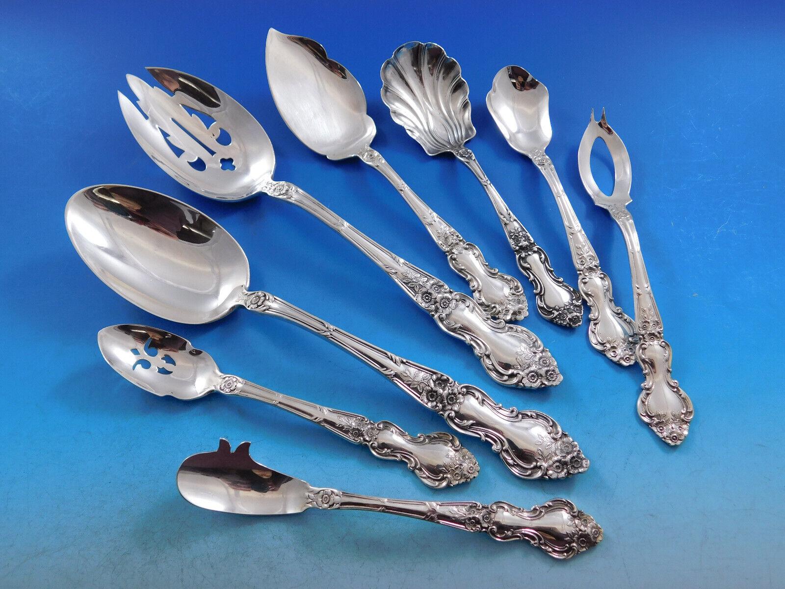 Monumental dinner and luncheon size Meadow Rose by Wallace Silver Flatware set, 225 pieces. This set includes:

12 Dinner Knives with blunt plated blades, 10 1/8