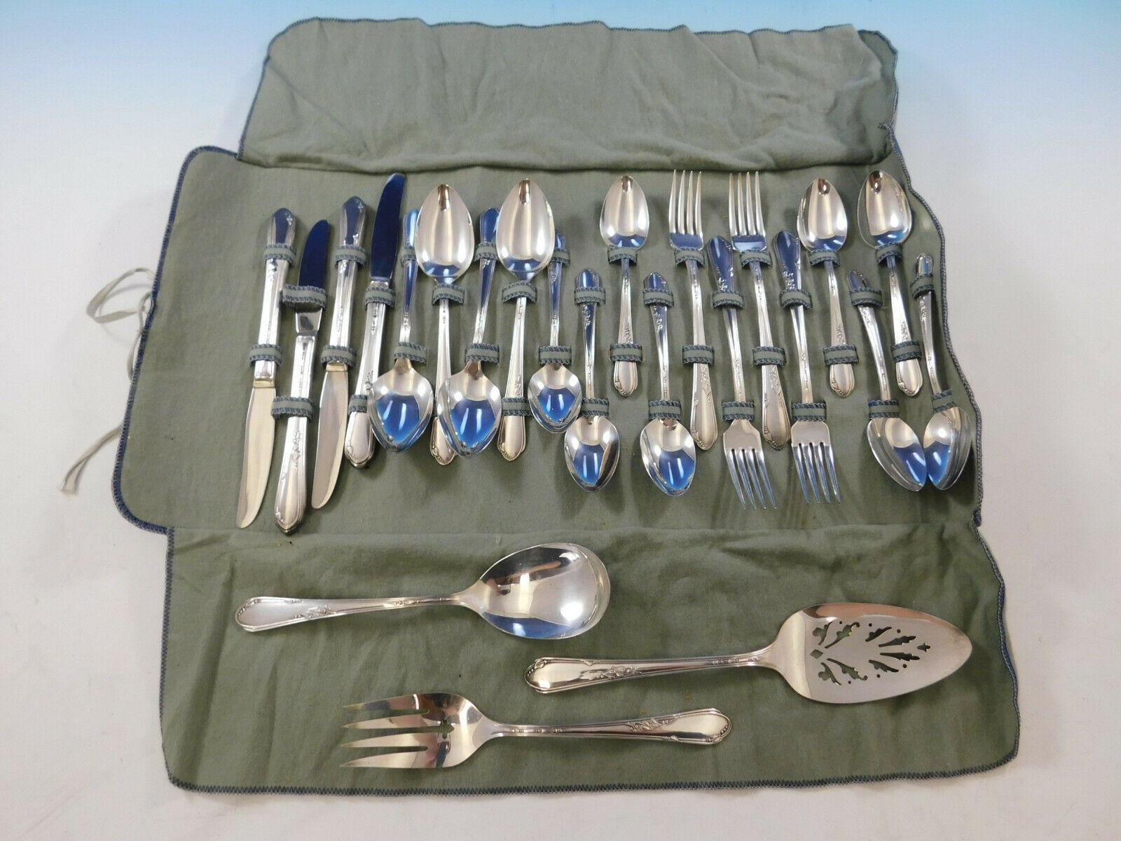 Meadowbrook AKA Heather by Wm. Rogers, circa 1936 Silver plate flatware set, 23 pieces. This set includes:

4 grille knives, 9 1/8
